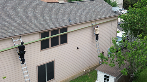 Seamless gutter install TexMax Services